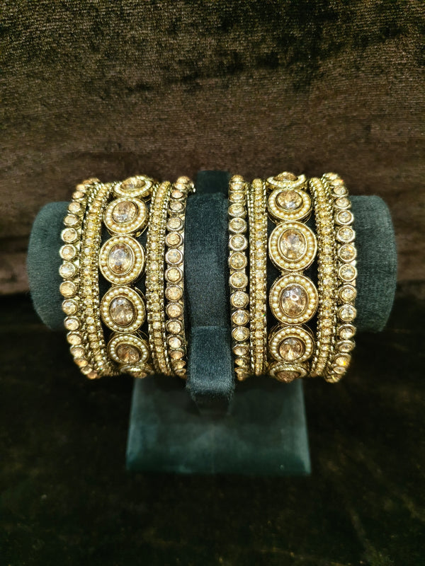Gold polish Bangles Size 2.4 with white stones