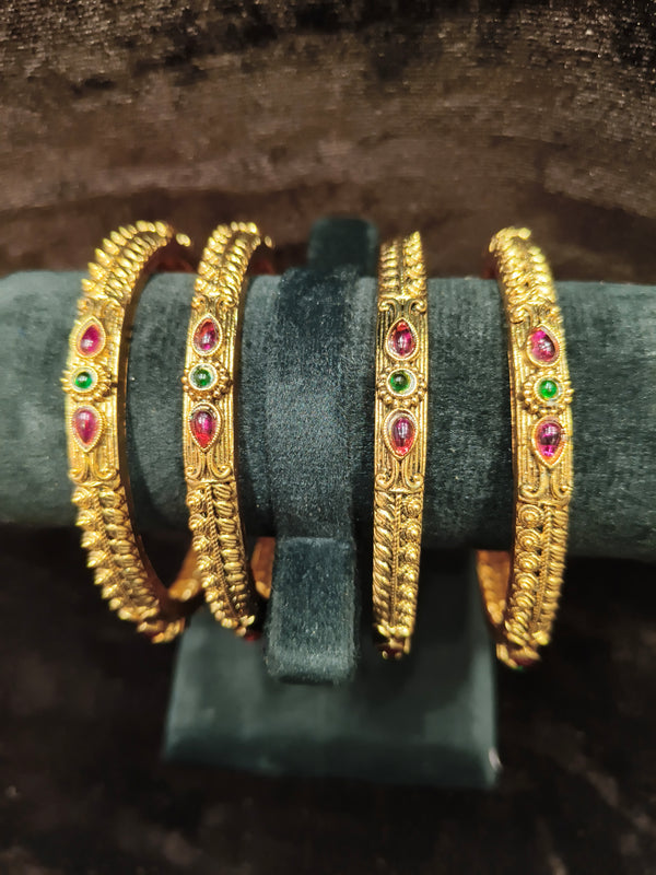 Gold polish 4 pic Bangles Size 2.4 with green red kundan