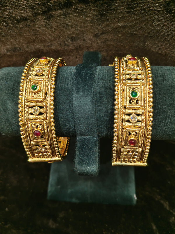 Gold polish 2 pic Bangles Size 2.4 with green red kundan