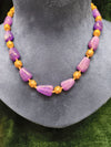 Colour and golden beads mala