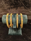 Gold polish 4 pic Bangles Size 2.4 with green red kundan
