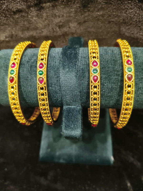 Gold polish 4 pic Bangles Size 2.4 with green red stone