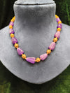 Colour and golden beads mala