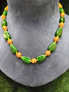 Green and golden beads mala