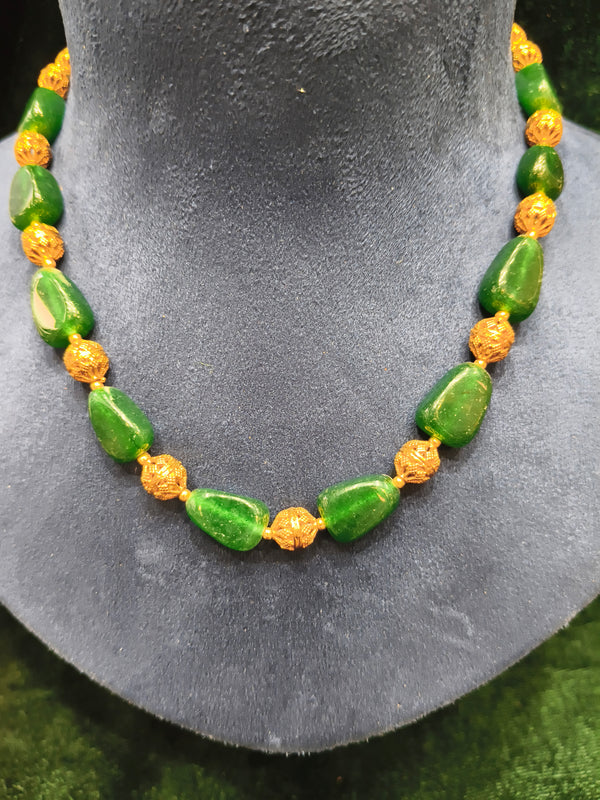 Green and golden beads mala