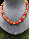 Red and golden beads mala