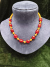 Red and golden beads mala