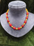 Red and golden beads mala