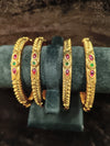 Gold polish 4 pic Bangles Size 2.4 with green red kundan