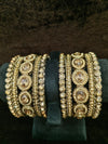 Gold polish Bangles Size 2.4 with white stones