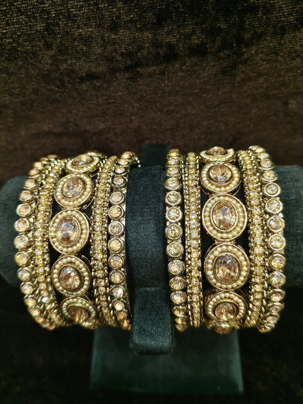 Gold polish Bangles Size 2.4 with white stones