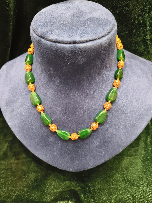 Green and golden beads mala