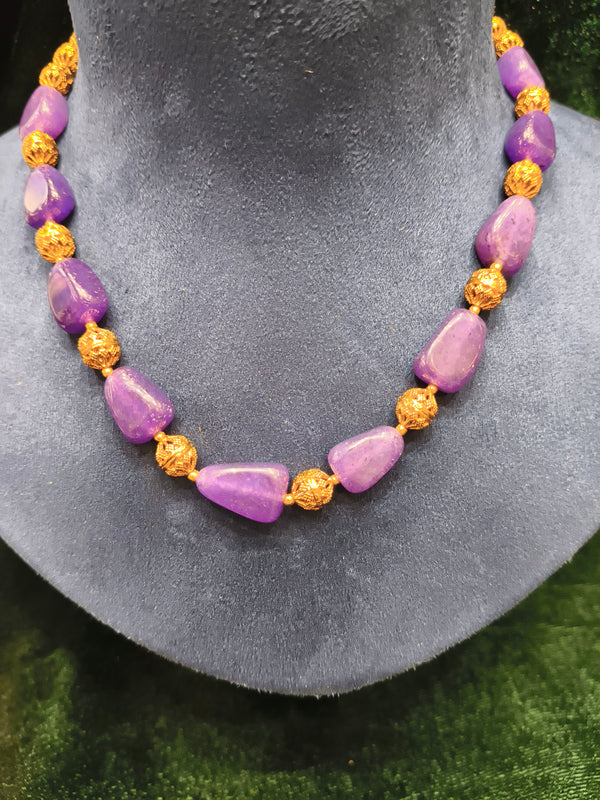Colour and golden beads mala
